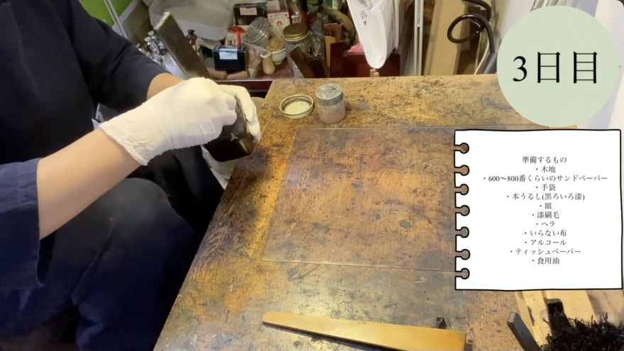 Clean the hake and store it properly — The maker works solvent through the hake to remove the bulk lacquer before the final oil wash.